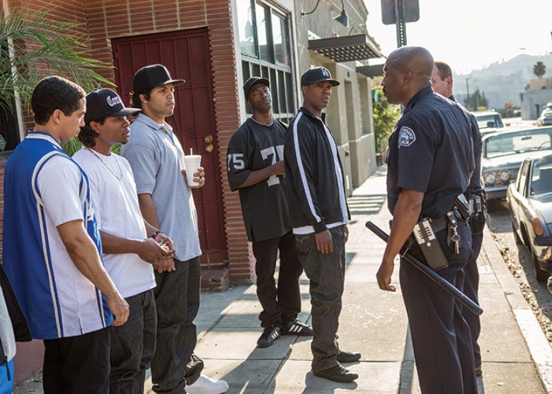 (L to R) DJ Yella (NEIL BROWN, JR.), Eazy-E (JASON MITCHELL), Ice Cube (O’SHEA JACKSON, JR.), MC Ren (ALDIS HODGE) and Dr. Dre (COREY HAWKINS) are harassed by the police in “Straight Outta Compton”. Taking us back to where it all began, the film tells the