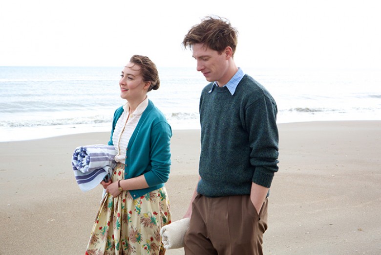Saoirse Ronan as “Eilis” and Domhnall Gleeson as “Jim” in BROOKLYN. Photo by Kerry Brown. © 2015 Twentieth Century Fox Film Corporation All Rights Reserved