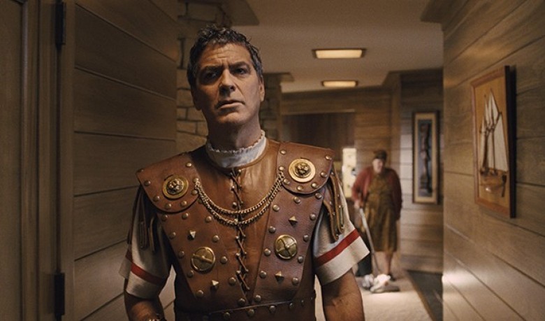 GEORGE CLOONEY stars as Baird Whitlock in “Hail, Caesar!.” Four-time Oscar®-winning filmmakers Joel and Ethan Coen produce and direct the all-star comedy set during the latter years of Hollywood’s Golden Age. Photo Credit: Universal Pictures Copyright: © 