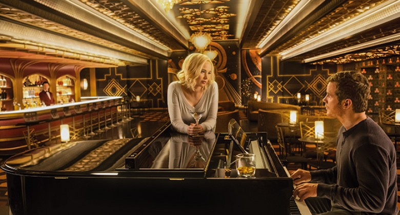 Jennifer Lawrence (center), Chris Pratt (right) and Michael Sheen (left) in Columbia Pictures’ PASSENGERS. PHOTO BY: Jaimie Trueblood © 2016 Columbia Pictures Industries, Inc. All Rights Reserved. **ALL IMAGES ARE PROPERTY OF SONY PICTURES ENTERTAINMENT I