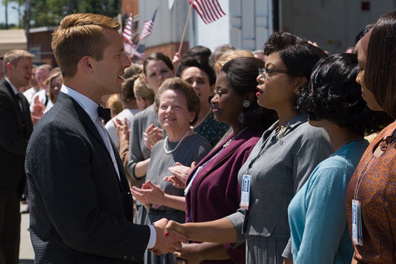 Katherine G. Johnson (Taraji P. Henson), flanked by fellow mathematicians Dorothy Vaughan (Octavia Spencer) and Mary Jackson (Janelle Monáe) meet the man they helped send into orbit, John Glenn (Glen Powell), in HIDDEN FIGURES. Photo Credit: Hopper Stone.