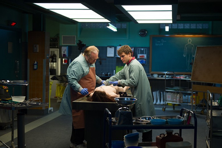 Emile Hirsch as Austin, Brian Cox as Tommy, and Olwen Kelly as Jane Doe from André Øvredal’s THE AUTOPSY OF JANE DOE. Courtesy of IFC Midnight. An IFC Midnight release.