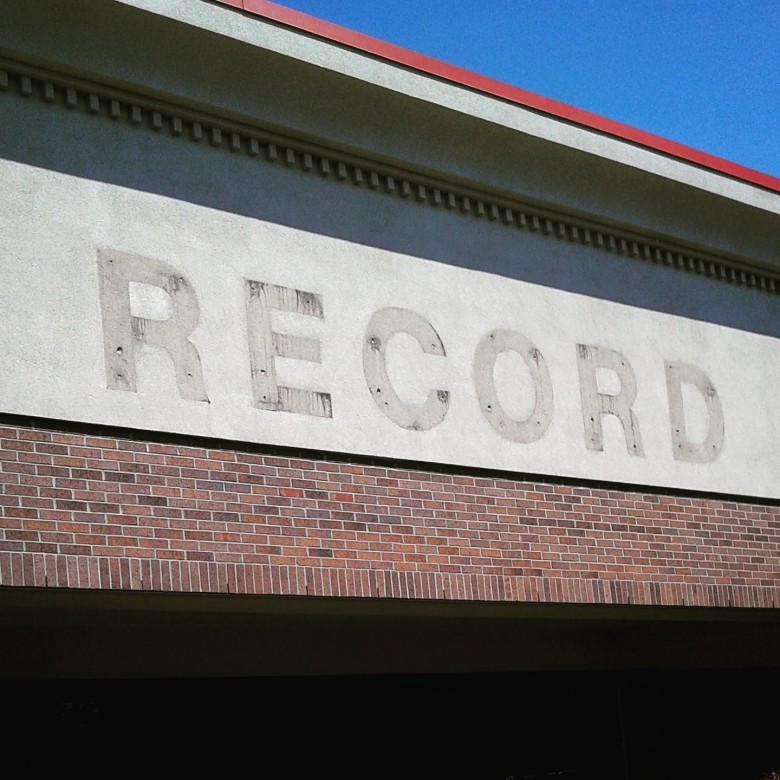 What was once the marquee for Record Theatre's University Plaza location now reads as an imperative — record what exists, for this too shall pass.