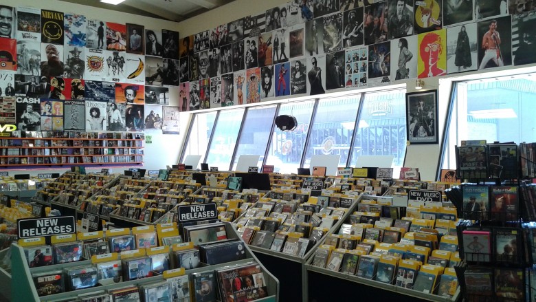 The front window space of Record Theatre's Main and Lafayette store, which once housed a huge inventory of 7" singles, carried DVDs in its final years.