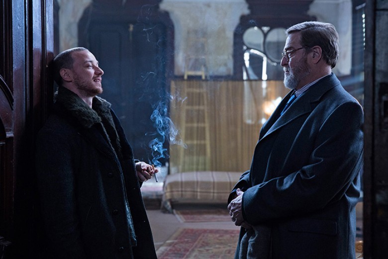 (L to R) JAMES MCAVOY as David Percival and JOHN GOODMAN as Emmett Kurzfeld in “Atomic Blonde.” Oscar® winner Charlize Theron explodes into summer in a breakneck action-thriller that follows MI6’s most lethal assassin through a ticking time bomb of a city