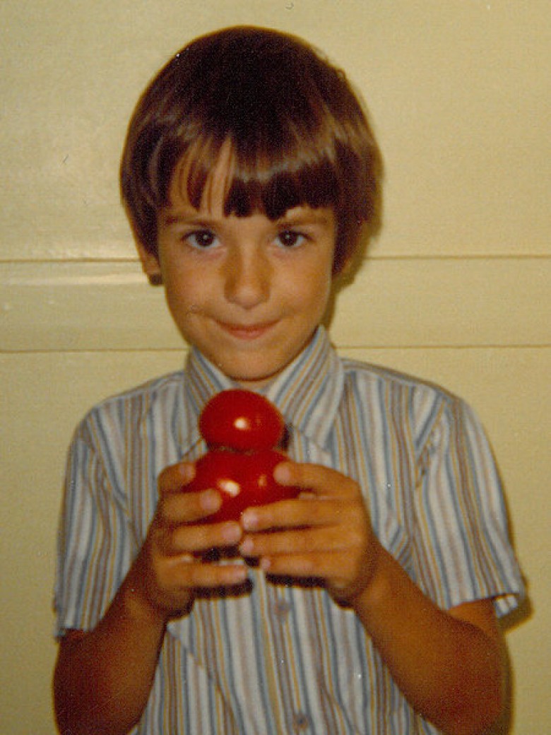 Future photographer John Carocci with homegrown tomatoes ready to be turned into marinara