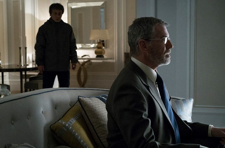 (Left to Right) Jackie Chan as Quan and Pierce Brosnan as Hennessy in hotel suite in THE FOREIGNER. Motion Picture Artwork © 2017 STX Financing, LLC. All Rights Reserved