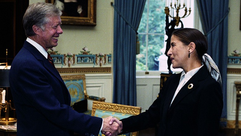 Justice Ginsburg and Jimmy Carter shaking hands, c. 1980 in RBG, a Magnolia Pictures release. Photo courtesy of Magnolia Pictures.