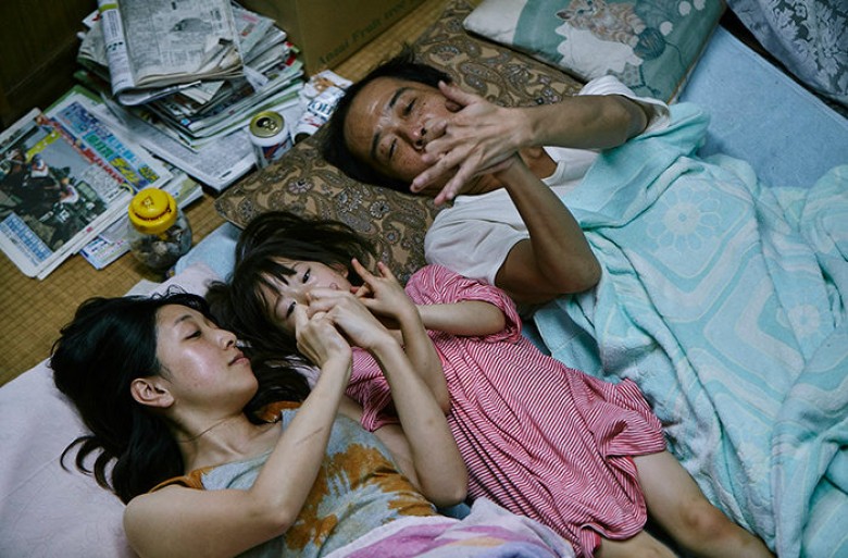 Ando Sakura, Sasaki Miyu and Lily Franky in SHOPLIFTERS, a Magnolia Pictures release. Photo courtesy of Magnolia Pictures.