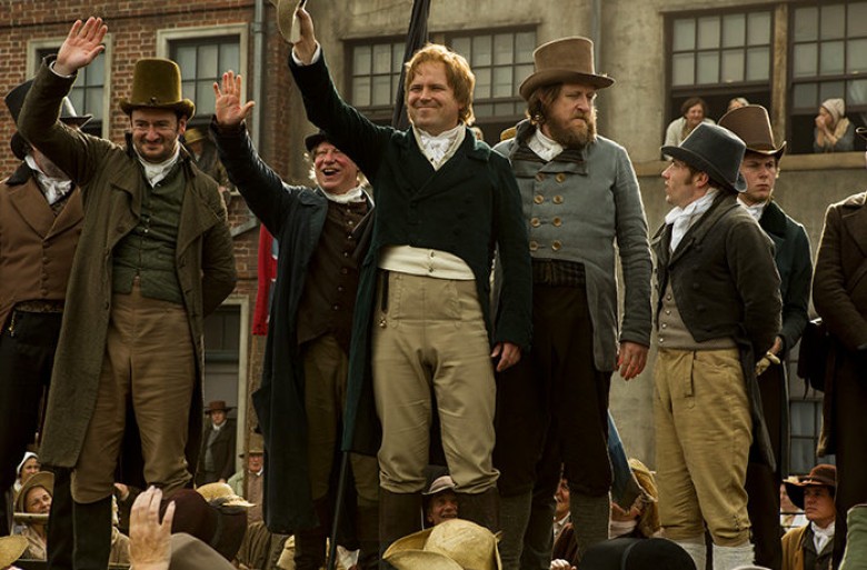 PETERLOO featuring John-Paul Hurley as John Thacker Saxton, Ian Mercer as Dr. Joseph Healey, Rory Kinnear as Henry Hunt, and Neil Bell as Samuel Bamford courtesy of Amazon Studios. Photo Credit Simon Mein; Courtesy of Amazon Studios