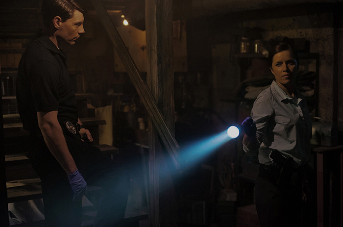 Detectives Gilpin (Patrick Fugit) and Boney (Kim Dickens) search for clues as they investigate a woman’s disappearance. Photo: Merrick Morton – TM and © 2014 Twentieth Century Fox and Regency Enterprises. All Rights Reserved. Not for sale or duplication.