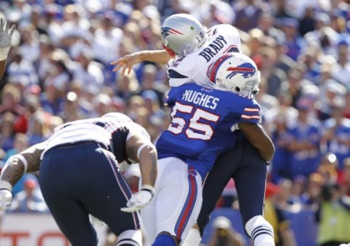 Bills DE Jerry Hughes getting a hit on Tom Brady