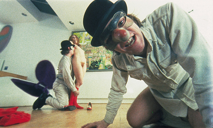 A Clockwork Orange, directed by Stanley Kubrick (1970-71; GB/United States). Alex DeLarge (Malcolm McDowell) and his droogs in the home of the writer, Mr. Alexander (Patrick Magee). © Warner Bros. Entertainment Inc