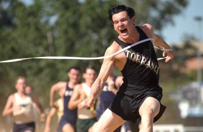 JACK O’CONNELL stars as Olympian and war hero Louis Zamperini in “Unbroken.” Photo Credit: David James Copyright: © 2014 Universal Studios. ALL RIGHTS RESERVED.