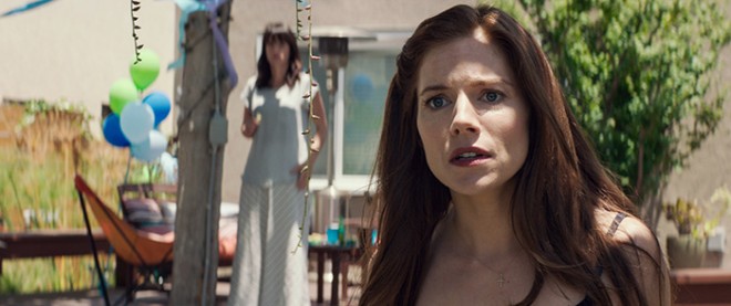 Photo Credit: Courtesy of Warner Bros. Pictures. Caption: SIENNA MILLER as Taya in Warner Bros. Pictures’ and Village Roadshow Pictures’ drama “AMERICAN SNIPER."