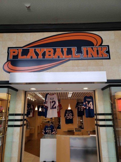Former Buffalo football greats sign at Playball Ink